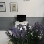 Aduepassi شقة